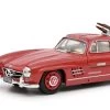 MB 300 SL Mit Ski Und Figur Von Schuco -Haushaltsgegenstände Geschäft mb 300 sl mit ski und figur von schuco farbe rot