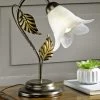 Tischleuchte Aus Metall Mit Dekorativem Blattwerk -Haushaltsgegenstände Geschäft tischleuchte aus metall mit dekorativem blattwerk farbe braun schwarz gold